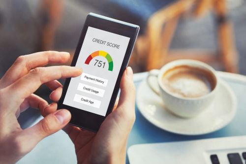 does divorce affect credit score concept — credit score on the screen of smartphone
