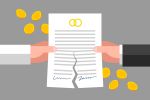 Torn contract is in man's and woman's hands, gold coins are around. Business and divorce concept