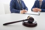 Law, advice and Legal services concept. Lawyer and attorney having team meeting at law firm.